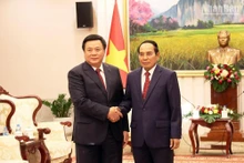 Đồng chí Nguyễn Xuân Thắng hội kiến Thường trực Ban Bí thư Đảng Nhân dân Cách mạng Lào, Phó Chủ tịch nước Lào Bounthong Chitmany.