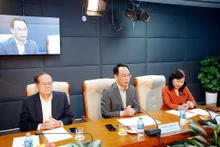 Các đại biểu trao đổi tại tọa đàm.