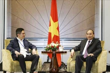 Chủ tịch nước Nguyễn Xuân Phúc tiếp Chủ tịch Phòng Thương mại và Công nghiệp Indonesia Arsjad Rasjid. (Ảnh: Thống Nhất/TXVN)