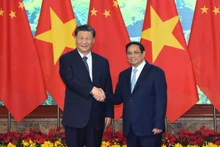 Thủ tướng Phạm Minh Chính đón Tổng Bí thư, Chủ tịch Trung Quốc Tập Cận Bình tại buổi hội kiến.