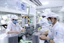Sản xuất linh kiện điện tử tại Công ty Youngbag ViiNa khu Công nghiệp Bình Xuyên, Vĩnh Phúc. Ảnh minh họa: TTXVN
