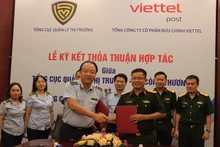 Lễ ký kết thỏa thuận hợp tác giữa Tổng cục Quản lý thị trường với Viettel Post.