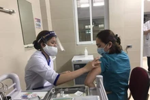 Hà Nội vận động người dân tiêm vaccine, chủ động phòng, chống dịch bệnh Covid-19.