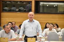 Chánh Văn phòng Bộ Nội vụ Vũ Đăng Minh trả lời câu hỏi của phóng viên tại họp báo.