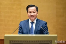 Phó Thủ tướng Lê Minh Khái báo cáo tại Hội nghị toàn quốc triển khai luật, nghị quyết của Quốc hội khóa XV. (Ảnh: DUY LINH)