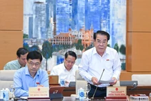 Trưởng Ban Dân nguyện Dương Thanh Bình trình bày báo cáo công tác dân nguyện của Quốc hội trong tháng 9/2023. (Ảnh: DUY LINH)