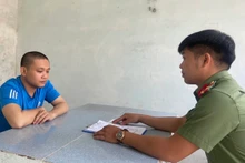 Đối tượng Trần Văn Miên tại cơ quan điều tra. (Ảnh: Công an cung cấp)