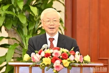 Tổng Bí thư Nguyễn Phú Trọng nói chuyện thân mật với các đại biểu dự Hội nghị biểu dương Chủ tịch Mặt trận Tổ quốc cấp xã và Trưởng ban Công tác Mặt trận tiêu biểu toàn quốc. (Ảnh: ĐĂNG KHOA)
