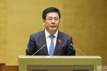 Bộ trưởng Công thương Nguyễn Hồng Diên trình bày Báo cáo thuyết minh về văn kiện gia nhập CPTPP của Liên hiệp Vương quốc Anh và Bắc Ireland. (Ảnh: DUY LINH)