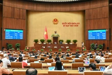 Kết quả biểu quyết thông qua Nghị quyết của Quốc hội về việc sửa đổi, bổ sung một số điều của Hiến pháp năm 2013. (Ảnh: THỦY NGUYÊN)