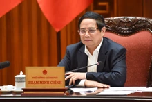 Thủ tướng Phạm Minh Chính chủ trì cuộc họp của Thường trực Chính phủ với các bộ, ngành về ứng phó với chính sách thuế quan mới của Hoa Kỳ. (Ảnh: TRẦN HẢI). 