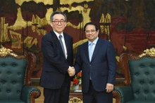 Thủ tướng Chính phủ Phạm Minh Chính và Bộ trưởng Ngoại giao Hàn Quốc. (Ảnh: TRẦN HẢI)