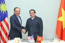 Thủ tướng Chính phủ Phạm Minh Chính và Thủ tướng Malaysia Anwar Ibrahim. (Ảnh: TRẦN HẢI)