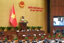 Quốc hội thảo luận về dự án Luật sửa đổi, bổ sung 7 luật quan trọng, sáng 11/7. (Ảnh: DUY LINH) 