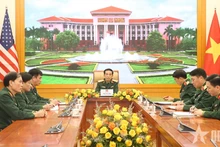 Quang cảnh buổi điện đàm. (Ảnh: Báo QĐND)