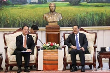 Bộ trưởng Khoa học và Công nghệ Huỳnh Thành Đạt tiếp kiến Thủ tướng Lào Sonexay Siphandone. Ảnh: Hải Tiến