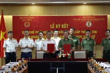 Lễ ký Quy chế phối hợp trong việc trao đổi, cung cấp thông tin tạm hoãn xuất cảnh bằng hình thức điện tử giữa Cục Thuế, Bộ Tài chính và Cục Quản lý xuất nhập cảnh, Bộ Công an.