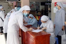 Nữ tu Công giáo hỗ trợ phòng chống dịch Covid-19 tại một bệnh viện ở Quận 11, Thành phố Hồ Chí Minh năm 2021. (Ảnh: Văn phòng Hội đồng Giám mục Việt Nam)