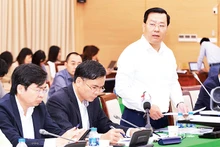 Giám đốc Sở Xây dựng Hà Nội Võ Nguyên Phong báo cáo tại Hội nghị triển khai Đề án đầu tư xây dựng ít nhất 1 triệu căn hộ nhà ở xã hội.