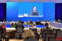 Bộ trưởng Tài chính Thái Lan Arkhom Termpittayapaisith chủ trì phiên họp. (Ảnh: NAM ĐÔNG)