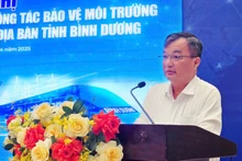 Phó Chủ tịch Ủy ban nhân dân tỉnh Bình Dương Bùi Minh Trí phát biểu ý kiến tại hội nghị ký kết. 