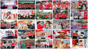 Người dân mọi miền Tổ quốc hào hứng chụp ảnh cùng Quốc kỳ.