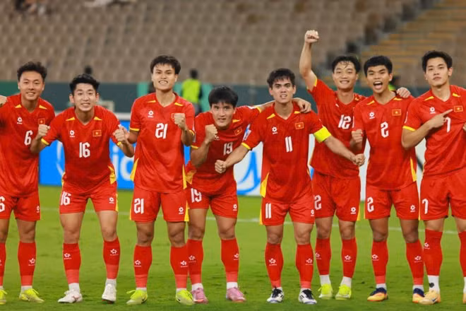 Đội tuyển U23 Việt Nam ăn mừng chiến thắng trong lượt trận vòng bảng tại Giải U23 châu Á. (Ảnh: Diệp Sơn Nam)