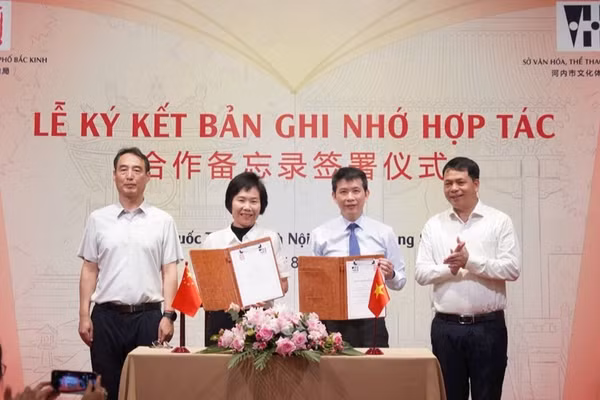 Các đại biểu tham gia lễ ký kết hợp tác. (Ảnh: Hoàng Lân)