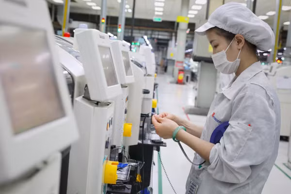 Việt Nam tiếp tục cải thiện môi trường kinh doanh nhằm thu hút hiệu quả dòng vốn đầu tư nước ngoài. (Ảnh: Lê Danh Lam) 