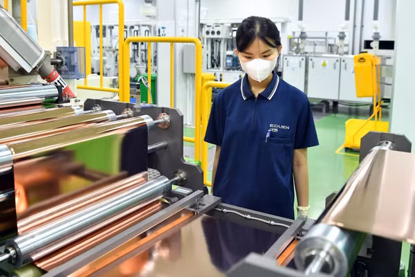  Sản xuất bảng mạch, thiết bị bảng mạch điện tử ở Công ty Trách nhiệm hữu hạn Doosan Electro-Materials Việt Nam (FDI Hàn Quốc) tại thành phố Hải Phòng. (Ảnh: ĐĂNG ANH) 