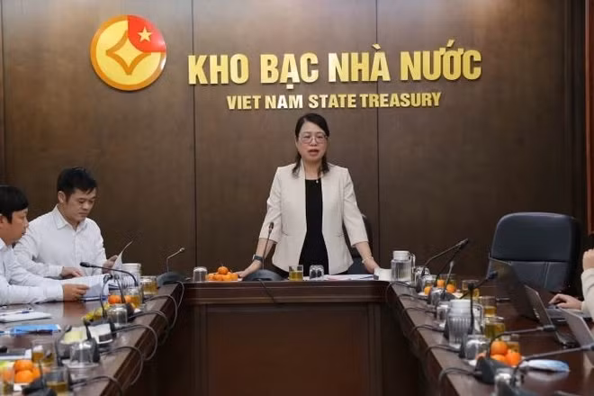 Phó Giám đốc Kho bạc Nhà nước Ngô Thị Nhung thông tin với báo chí về kết quả hoạt động của Kho bạc Nhà nước năm 2025, định hướng năm 2026.