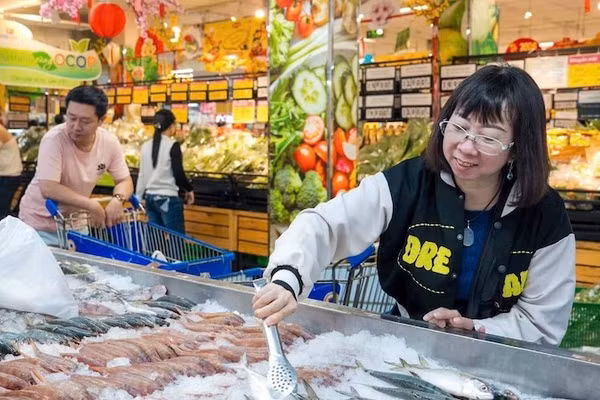 Người dân mua thực phẩm tại siêu thị Co.opmart Cống Quỳnh, Thành phố Hồ Chí Minh. (Ảnh HỮU HẠNH)
