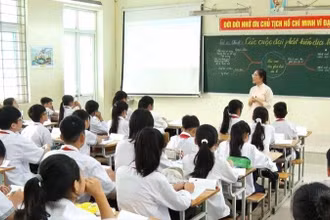Giờ học tại Trường THCS Tân Tiến, xã Xuân Mai, thành phố Hà Nội. (Ảnh THÚY QUỲNH)