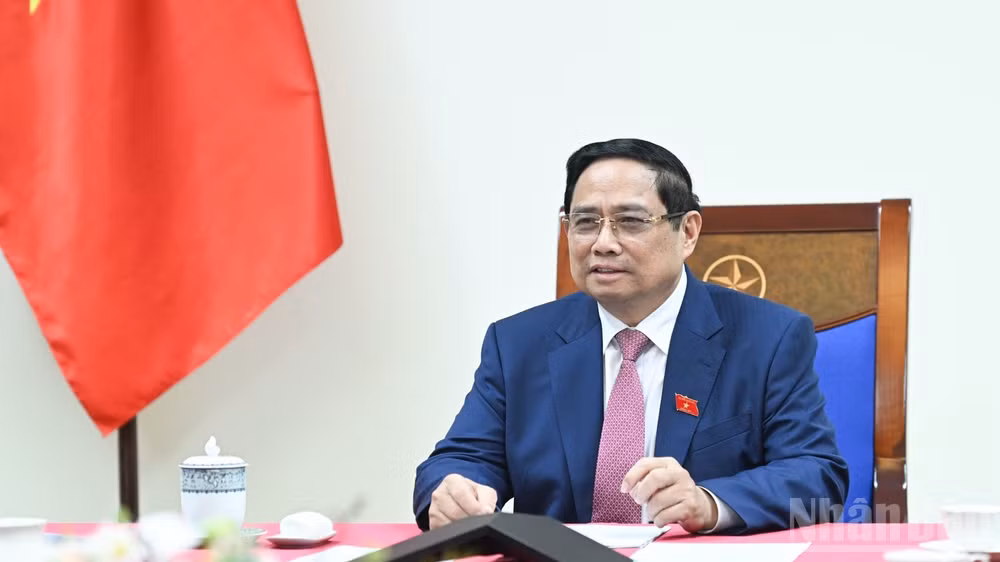 Thủ tướng Chính phủ Phạm Minh Chính đã điện đàm với Tổng Giám đốc Tập đoàn Nhà nước về Năng lượng nguyên tử Liên bang Nga (Rosatom) Alexey Likhachev. (Ảnh: TRẦN HẢI)
