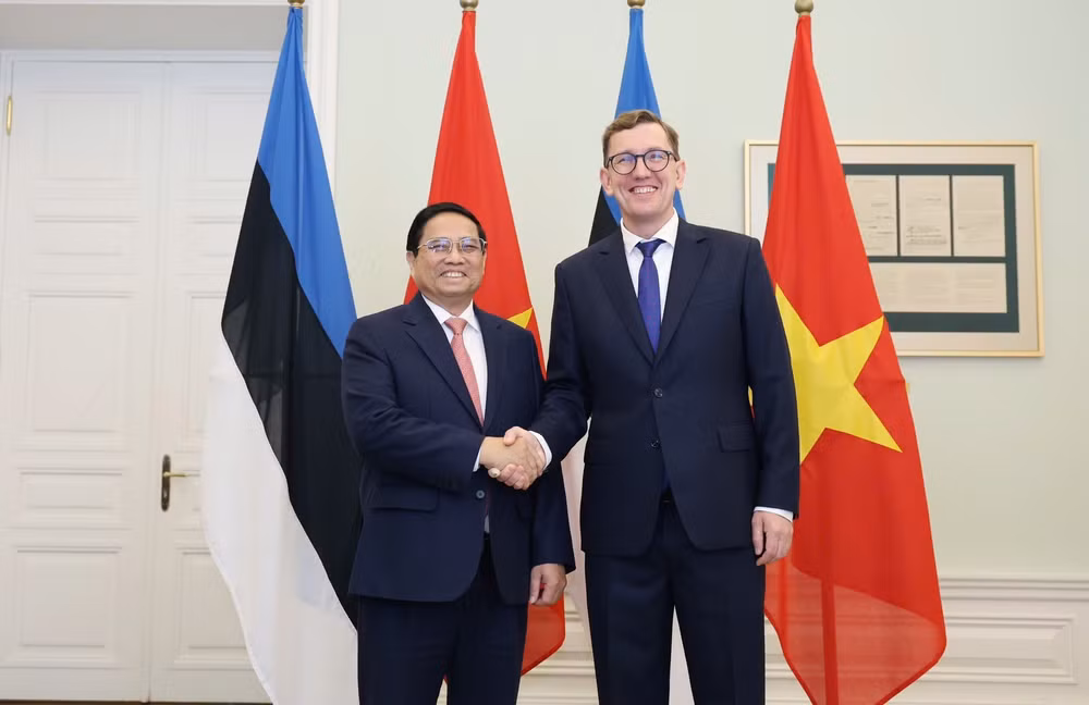 Thủ tướng Chính phủ Phạm Minh Chính và Thủ tướng Estonia Kristen Michal (Ảnh: Dương Giang/TTXVN).