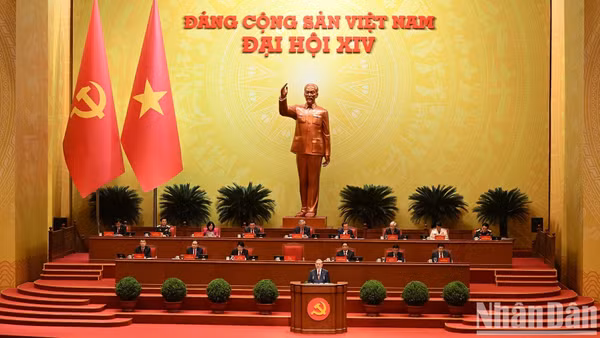 Tổng Bí thư Tô Lâm Báo cáo về các văn kiện trình Đại hội XIV Đảng Cộng sản Việt Nam tại phiên khai mạc Đại hội đại biểu toàn quốc lần thứ XIV Đảng Cộng sản Việt Nam. (Ảnh: TRẦN HẢI)