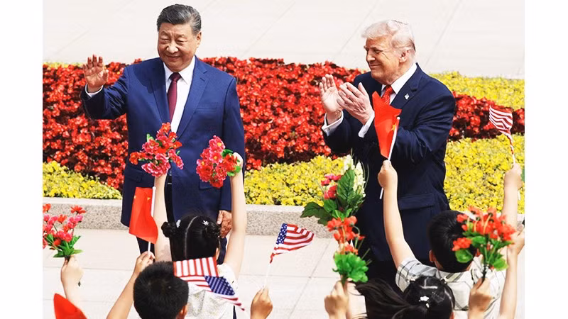 Hai nhà lãnh đạo Trung Quốc (bên trái) và Mỹ gặp gỡ tại Bắc Kinh. Ảnh: BBC