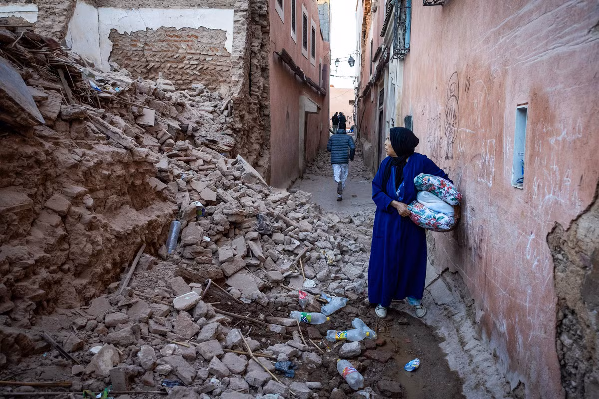 Đống đổ nát của một tòa nhà bị sập sau động đất. (Ảnh: AFP/Getty Images/CNN)