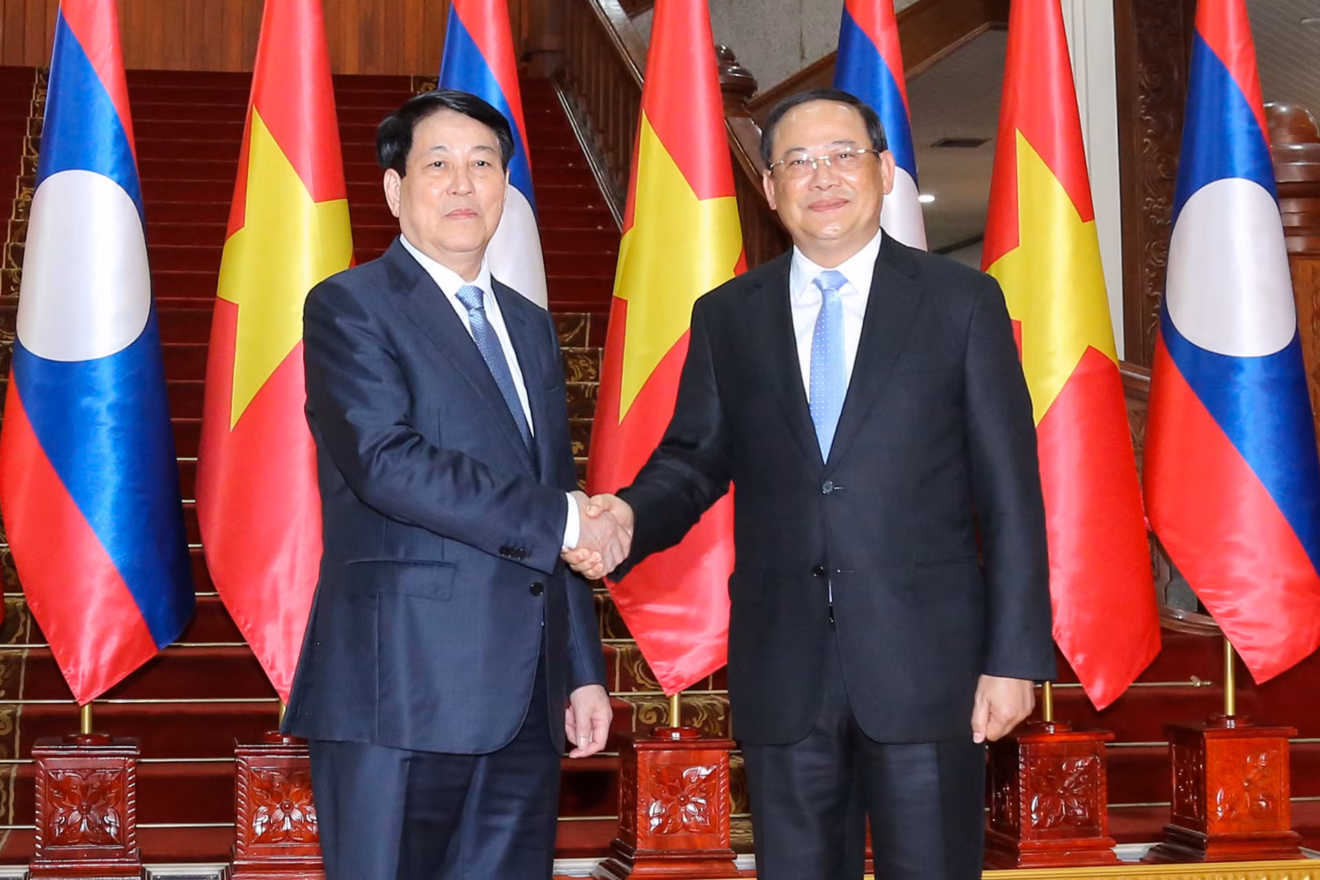 Chủ tịch nước Lương Cường và Thủ tướng Lào Sonexay Siphandone tại hội kiến.