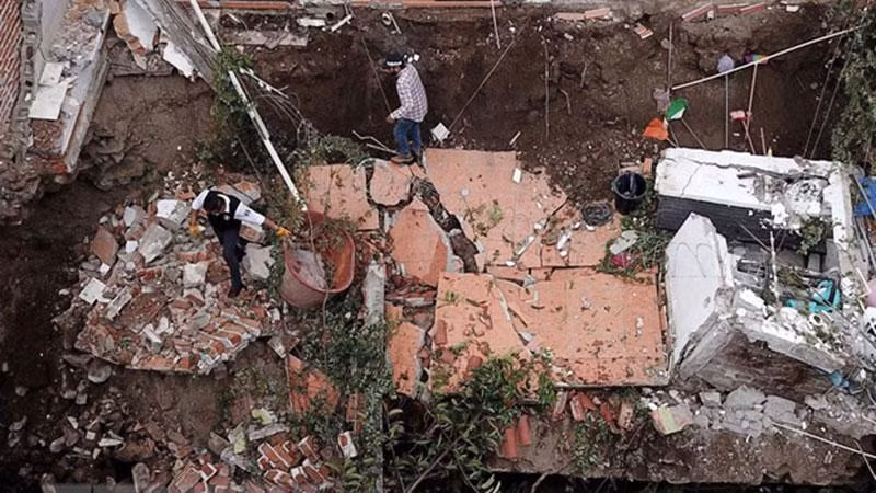 Một ngôi nhà đổ sập do động đất tại bang Colima, Mexico ngày 19/9. (Ảnh: AFP/TTXVN)