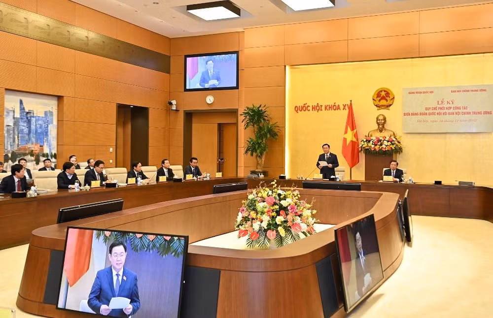 Quang cảnh lễ ký quy chế phối hợp công tác giữa Đảng đoàn Quốc hội với Ban Nội chính Trung ương.