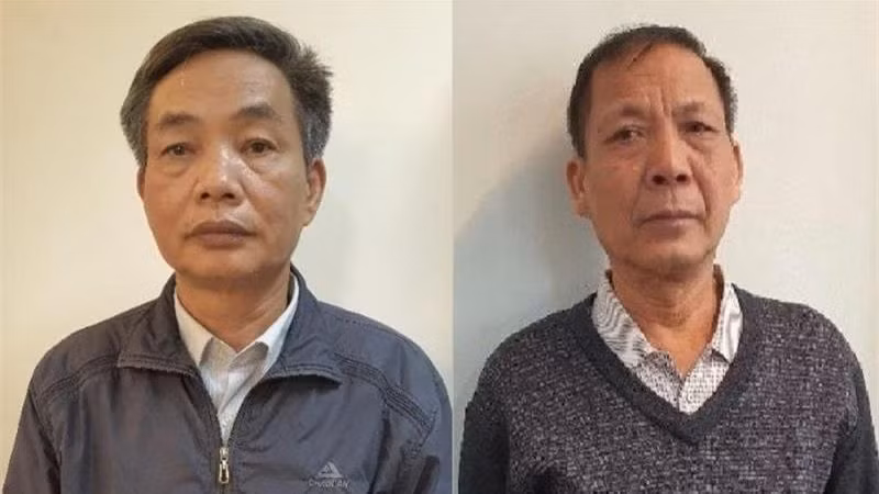 Bị can Đặng Ngọc Cầm (bên trái) và bị can Nguyễn Quốc Khánh (bên phải).