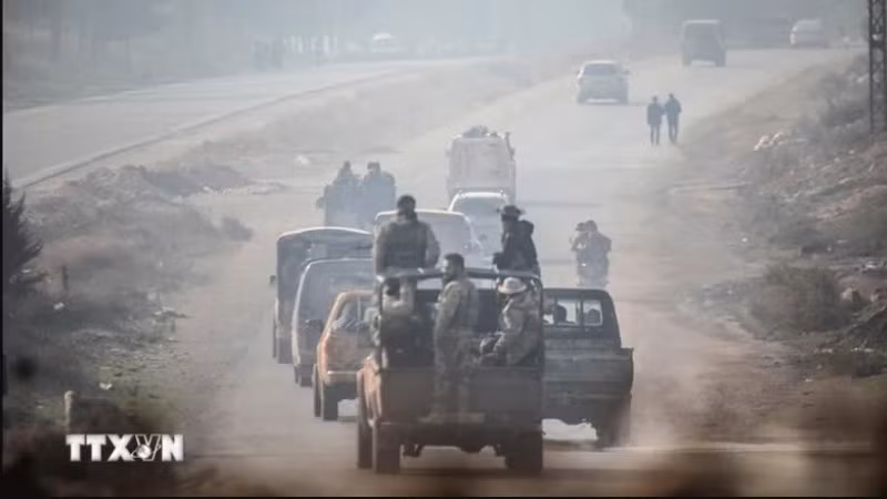 Các thành viên thuộc các nhóm vũ trang tiến về miền Bắc Syria. (Ảnh minh họa: AA/TTXVN)