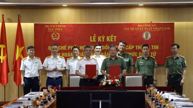Lễ ký Quy chế phối hợp trong việc trao đổi, cung cấp thông tin tạm hoãn xuất cảnh bằng hình thức điện tử giữa Cục Thuế, Bộ Tài chính và Cục Quản lý xuất nhập cảnh, Bộ Công an.