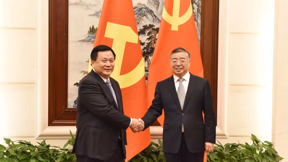 Đồng chí Nguyễn Xuân Thắng hội đàm với đồng chí Lý Thư Lỗi.