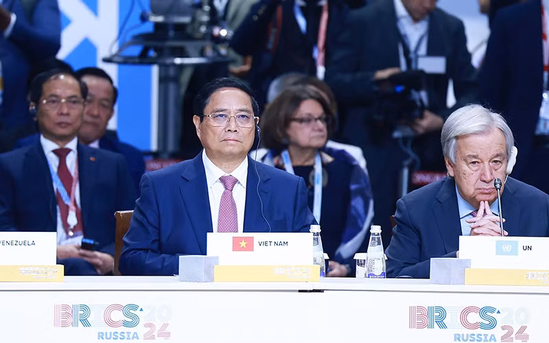 Thủ tướng Phạm Minh Chính tham dự và phát biểu tại Phiên toàn thể Hội nghị các Nhà lãnh đạo Nhóm BRICS mở rộng. (Ảnh TTXVN) Thủ tướng Phạm Minh Chính tham dự và phát biểu tại Phiên toàn thể Hội nghị các Nhà lãnh đạo Nhóm BRICS mở rộng. (Ảnh TTXVN)