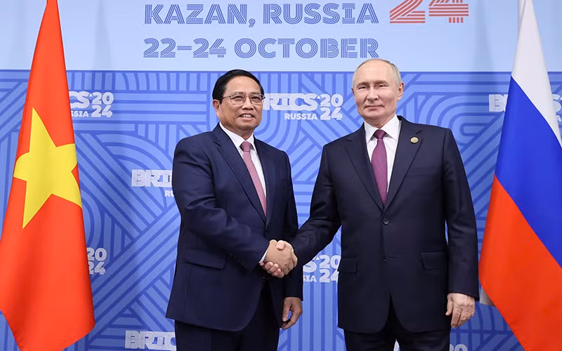 Thủ tướng Phạm Minh Chính gặp Tổng thống Liên bang Nga Vladimir Putin, Chủ tịch Nhóm BRICS năm 2024. (Ảnh: TTXVN) Thủ tướng Phạm Minh Chính gặp Tổng thống Liên bang Nga Vladimir Putin, Chủ tịch Nhóm BRICS năm 2024. (Ảnh: TTXVN)