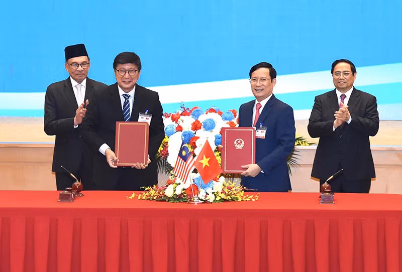 Lễ ký Bản ghi nhớ về hợp tác giữa Liên đoàn Thương mại và Công nghiệp Việt Nam với Phòng Thương mại và Công nghiệp quốc gia Malaysia.