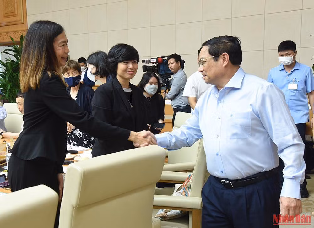 Thủ tướng Phạm Minh Chính với các chuyên gia, nhà khoa học và tổ chức quốc tế tại Việt Nam.