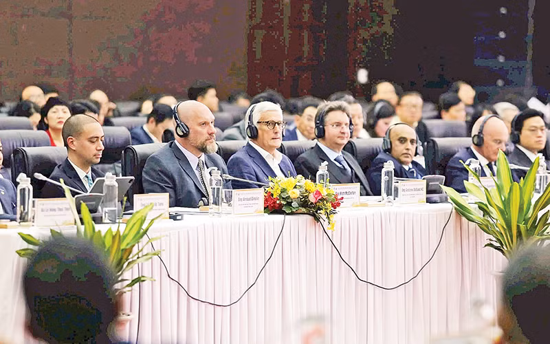 Các chuyên gia, nhà đầu tư quốc tế tham dự Hội thảo “Phát triển Trung tâm tài chính khu vực và quốc tế tại Việt Nam”. (Ảnh HS)